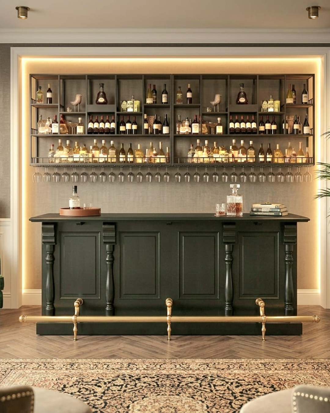 Modern bar setup with dark wooden bar and shelves filled with bottles and glasses.