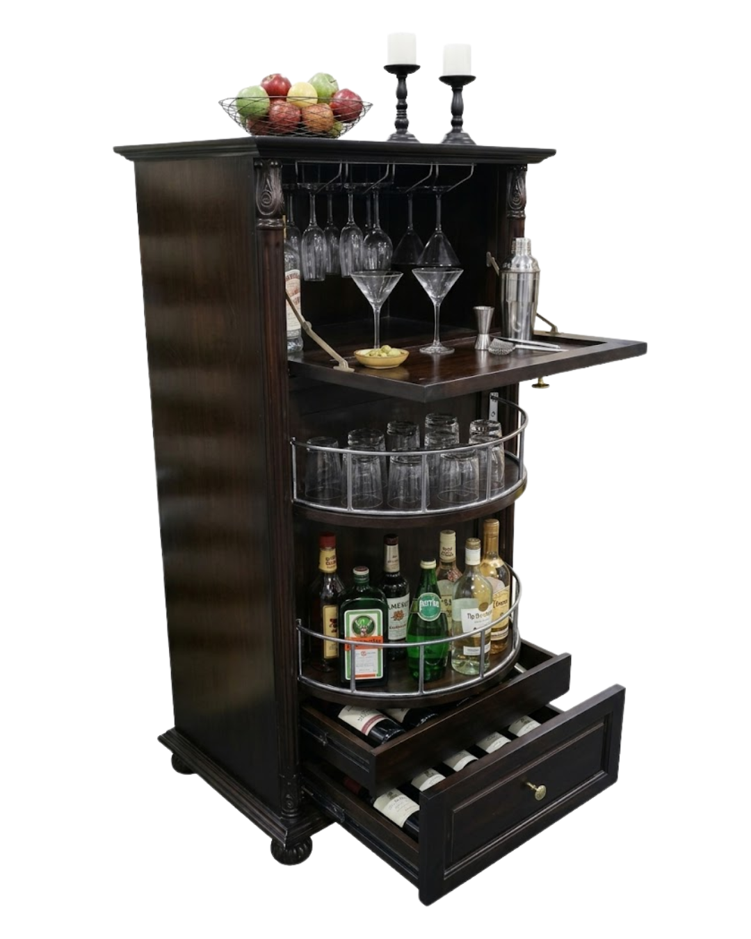 Brown bar storage with wine bottles, glasses, and a fruit bowl